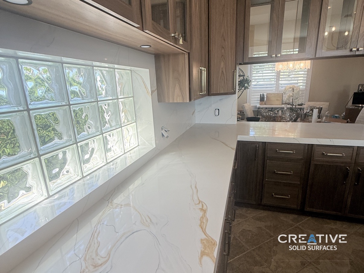 Warm wood, bold gold veining.